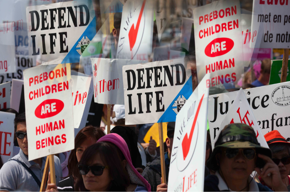 March for life showing Anti-abortion signs